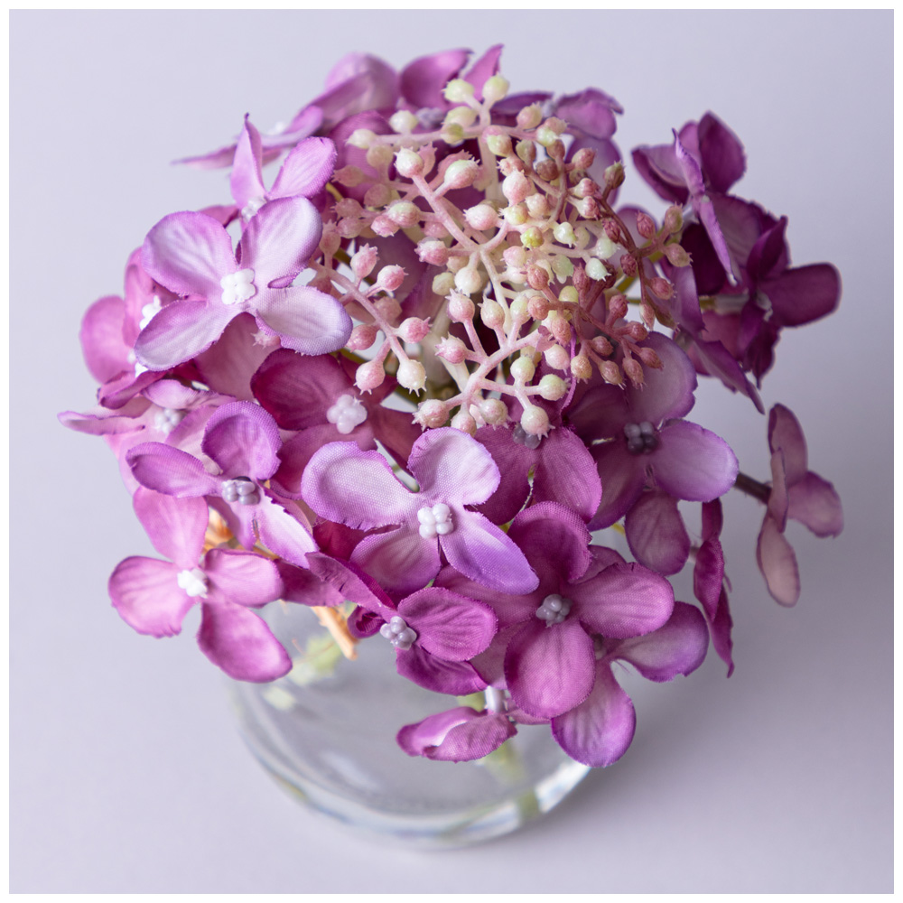 БУКЕТ ИСКУССТВЕННЫХ ЦВЕТОВ В КРУГЛОЙ ВАЗЕ ВЫСОТА= 14СМ, МАЛ=8ШТ./КОР=64ШТ.