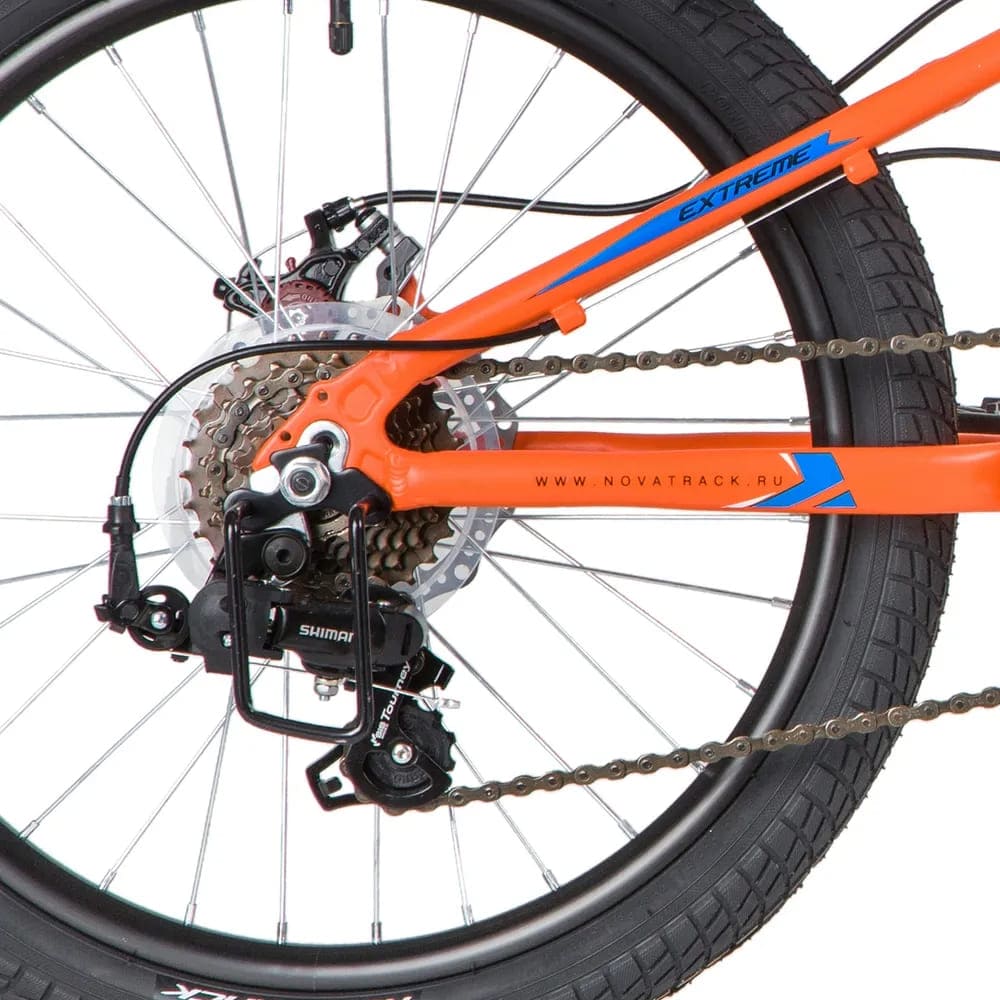 Велосипед NOVATRACK 20" EXTREME, оранжевый, алюм., 7 скор., Shimano/MICROSHIFT DISC